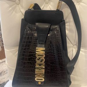 Moshino handbag . Lamb skin w/ croco embossed front panel. 14”H x 10” L x 5 “W